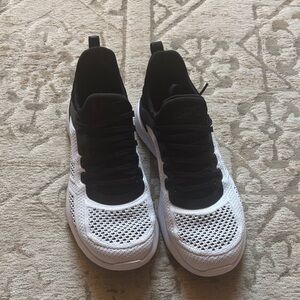 APL Women's TechLoom Tracer 
Black and White Athletic Shoes